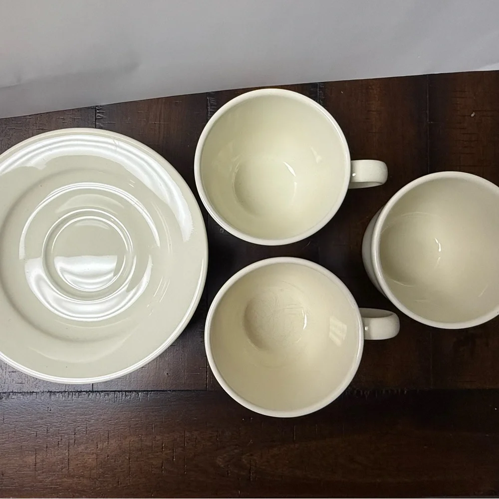 Williams Sonoma Belvedere Cream colored earthware flat cups and saucers